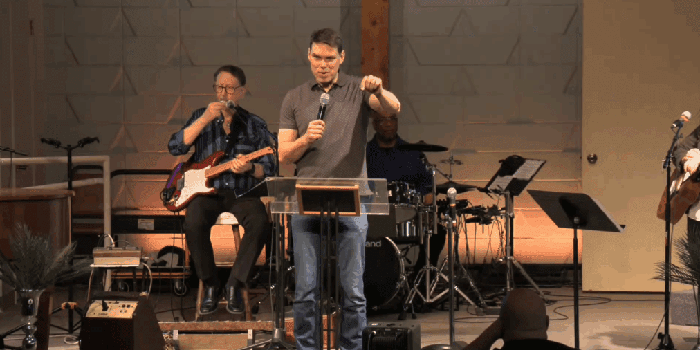 Pastor Ben preaching at Riverview Church