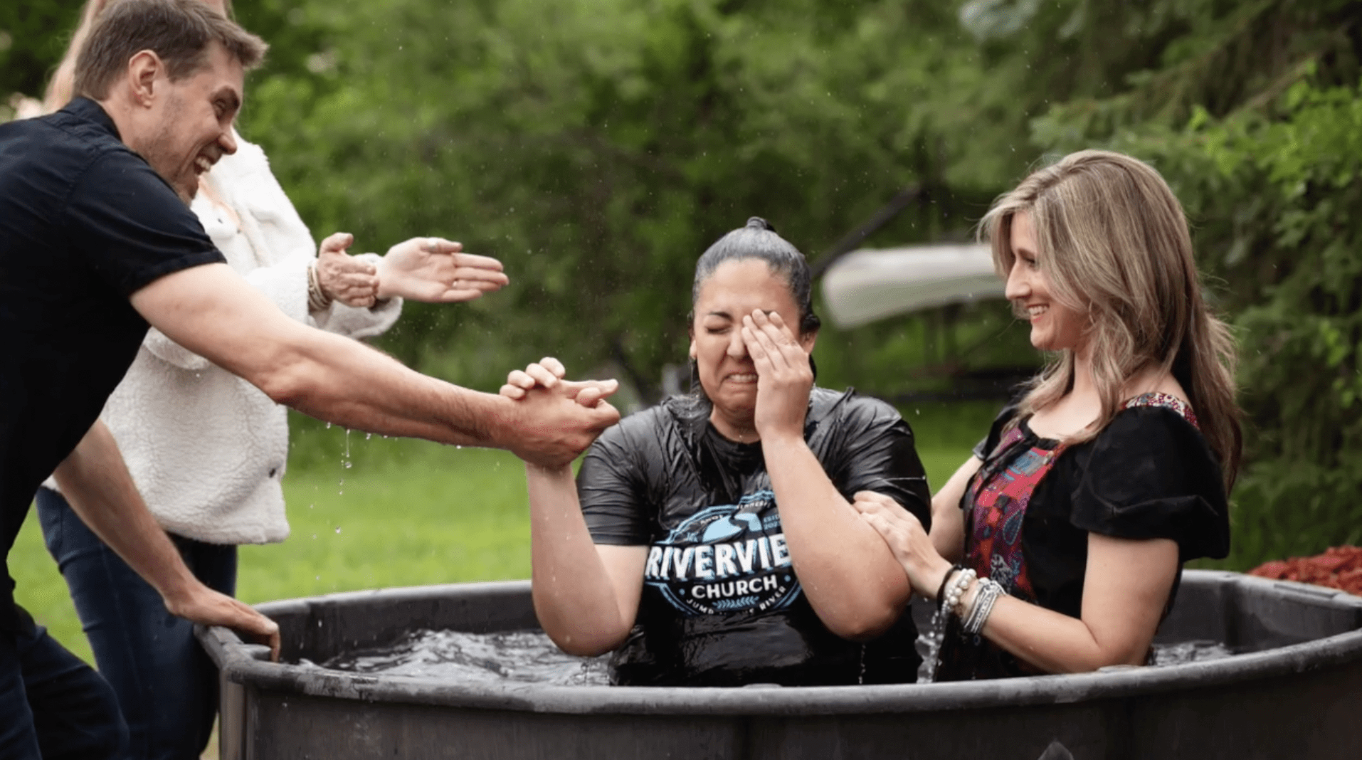 Baptism team members ready to welcome you at Riverview Church